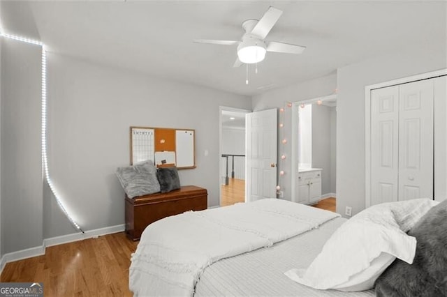 1860 Hill Chase, Alpharetta, GA 30022 - bedroom featuring a closet, baseboards, light wood-style flooring, and ceiling fan