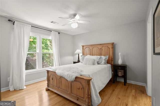 1860 Hill Chase, Alpharetta, GA 30022 - bedroom with light wood finished floors and a ceiling fan