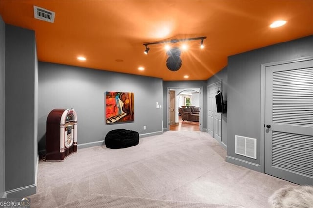 1860 Hill Chase, Alpharetta, GA 30022 - carpeted home theater featuring arched walkways, baseboards, recessed lighting, and track lighting