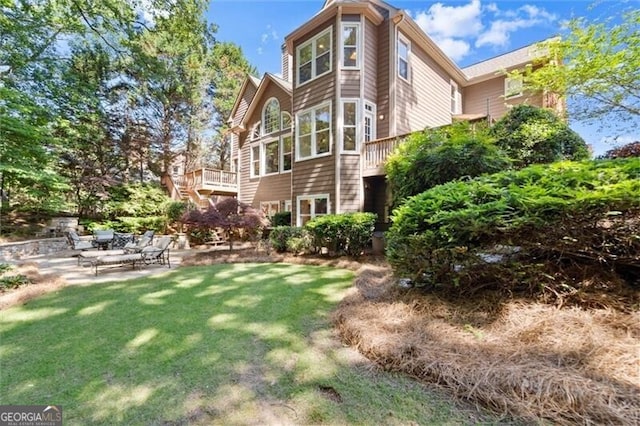 1860 Hill Chase, Alpharetta, GA 30022 - back of house with a lawn and a patio