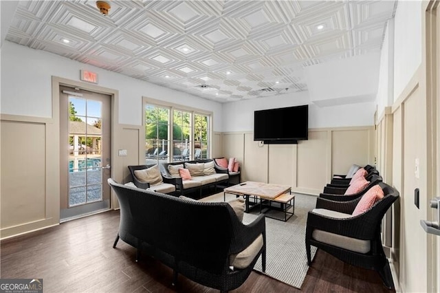 1860 Hill Chase, Alpharetta, GA 30022 - living area featuring an ornate ceiling, dark wood-type flooring, a decorative wall, and a wainscoted wall