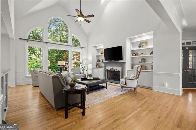 1860 Hill Chase, Alpharetta, GA 30022 - living room with a fireplace, built in features, high vaulted ceiling, light wood-style floors, and a ceiling fan