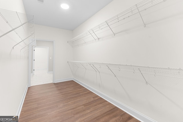 488 Nandina Ct, Warner Robins, GA 31088 - spacious closet featuring wood finished floors