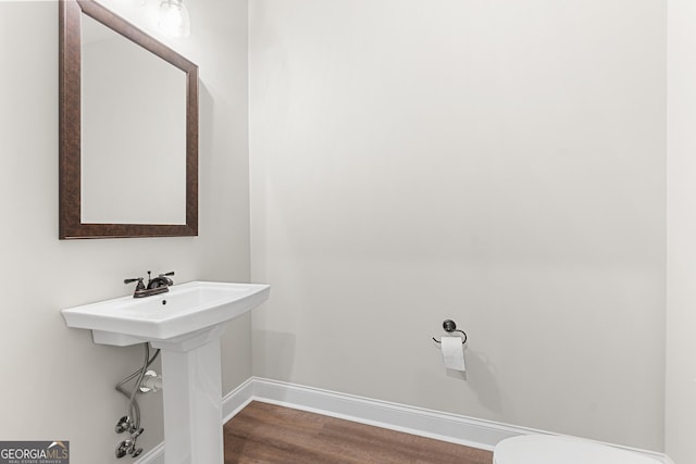 488 Nandina Ct, Warner Robins, GA 31088 - half bathroom featuring baseboards and wood finished floors