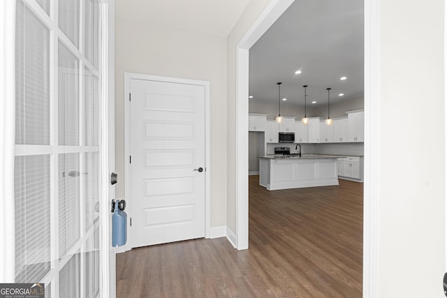 488 Nandina Ct, Warner Robins, GA 31088 - foyer with dark wood-type flooring and recessed lighting
