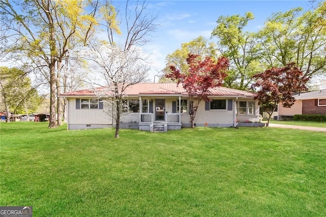 5798 Salem Rd, Covington, GA 30016 - ranch-style house featuring a porch, crawl space, a front lawn, and metal roof