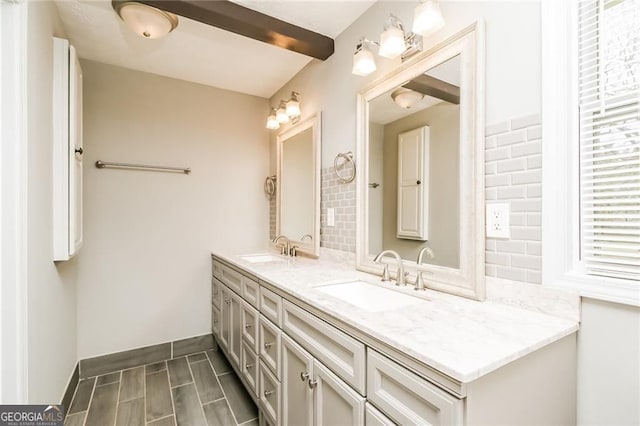 5798 Salem Rd, Covington, GA 30016 - bathroom featuring double vanity and baseboards