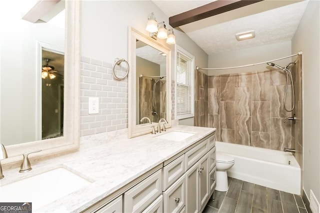 5798 Salem Rd, Covington, GA 30016 - full bath featuring double vanity, tub / shower combination, toilet, a ceiling fan, and wood finished floors