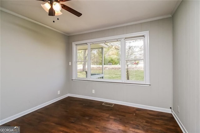 5798 Salem Rd, Covington, GA 30016 - empty room featuring dark wood finished floors, a ceiling fan, ornamental molding, and baseboards