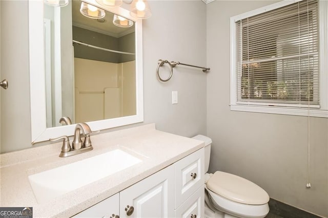 5798 Salem Rd, Covington, GA 30016 - full bathroom featuring vanity, a shower, and toilet