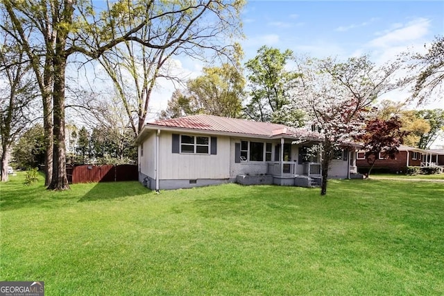 5798 Salem Rd, Covington, GA 30016 - view of front of home with crawl space, metal roof, and a front yard