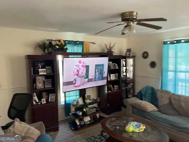 174 S Brunswick St, Jesup, GA 31546 - living room with ceiling fan, plenty of natural light, and wood finished floors