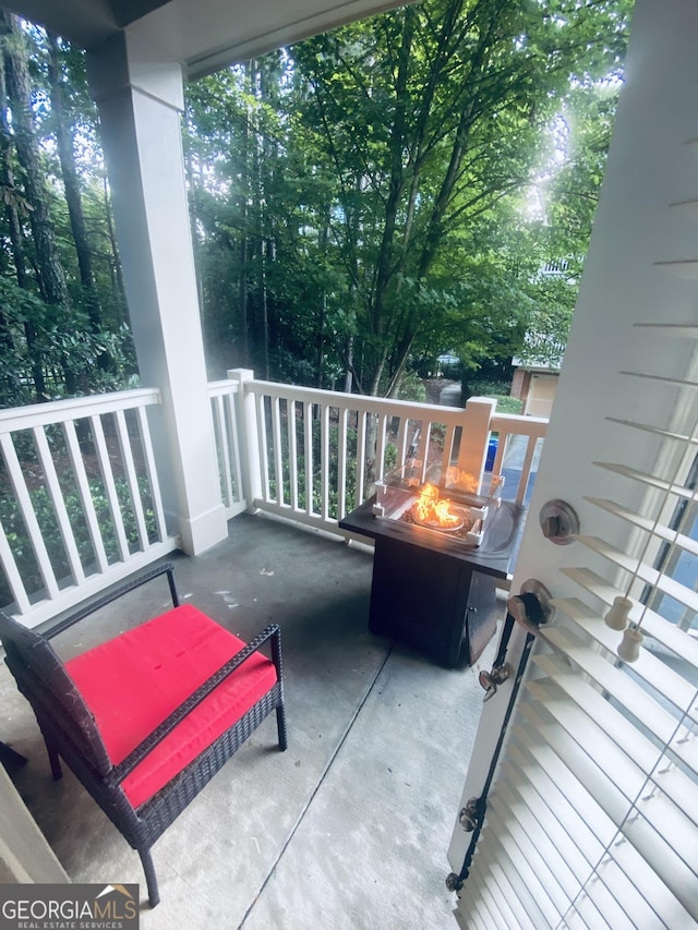 241 Perimeter Walk, Atlanta, GA 30338 - porch featuring an outdoor fire pit