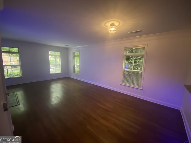 241 Perimeter Walk, Atlanta, GA 30338 - empty room with dark wood-type flooring, plenty of natural light, crown molding, and baseboards