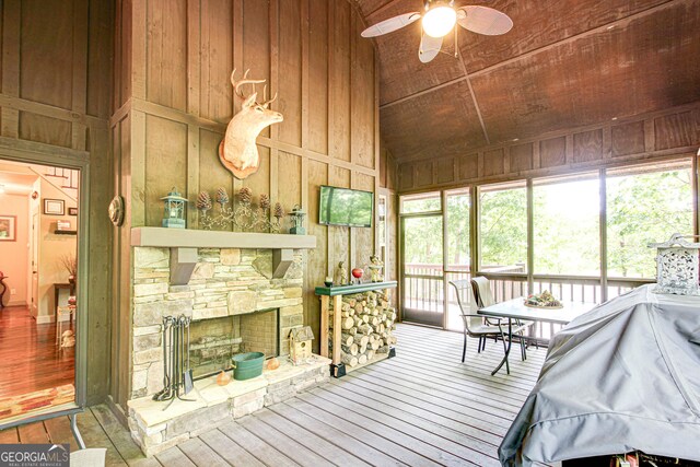 496 Cedar Valley Dr, Wedowee, AL 36278 - sunroom / solarium with ceiling fan, lofted ceiling, and a stone fireplace