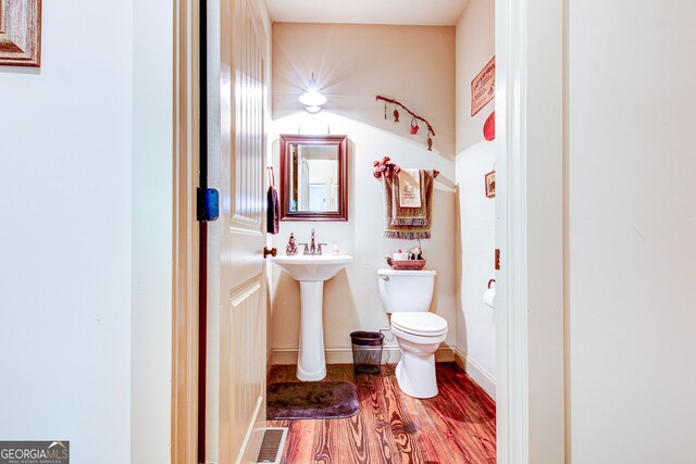 496 Cedar Valley Dr, Wedowee, AL 36278 - half bath with toilet and wood finished floors