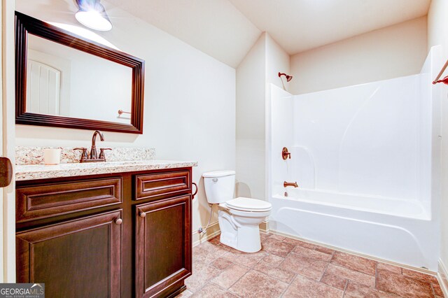 496 Cedar Valley Dr, Wedowee, AL 36278 - bathroom featuring shower / bathtub combination, vanity, and stone finish flooring