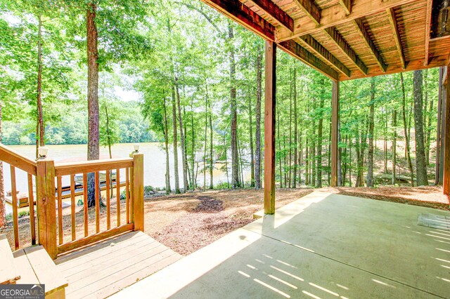 496 Cedar Valley Dr, Wedowee, AL 36278 - wooden terrace featuring a patio area
