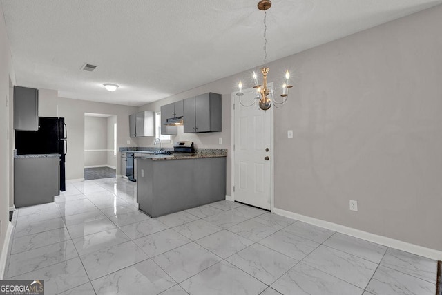 3885 Riverview Chase Blf, Ellenwood, GA 30294 - kitchen with light marble finish flooring, baseboards, a chandelier, and a peninsula