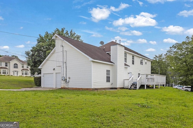 3885 Riverview Chase Blf, Ellenwood, GA 30294 - back of property featuring a wooden deck, a lawn, a garage, and a chimney
