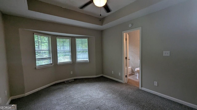 5710 Cardigan Trce, Sugar Hill, GA 30518 - empty room with carpet, ceiling fan, baseboards, and a tray ceiling