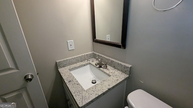 5710 Cardigan Trce, Sugar Hill, GA 30518 - half bathroom with vanity and toilet