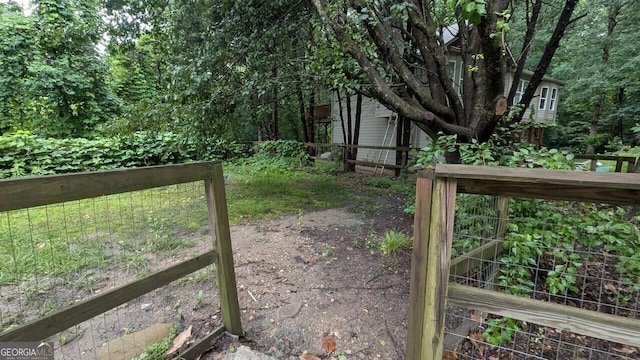 5710 Cardigan Trce, Sugar Hill, GA 30518 - view of yard with a vegetable garden