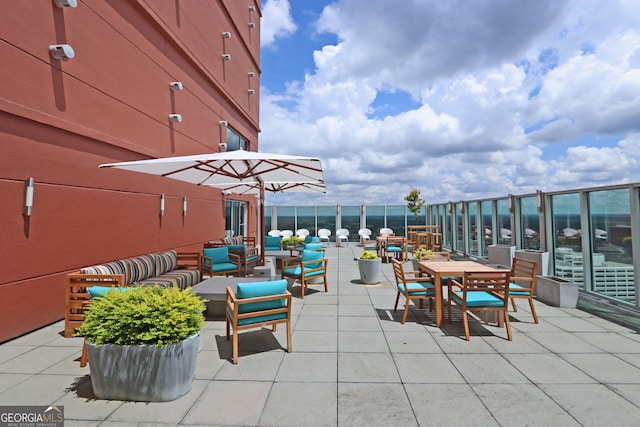 4561 Olde Perimeter Way Unit 608, Dunwoody, GA 30346 - view of patio featuring an outdoor living space and outdoor dining area