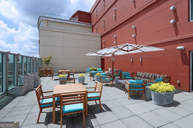 4561 Olde Perimeter Way Unit 608, Dunwoody, GA 30346 - view of patio / terrace featuring outdoor lounge area