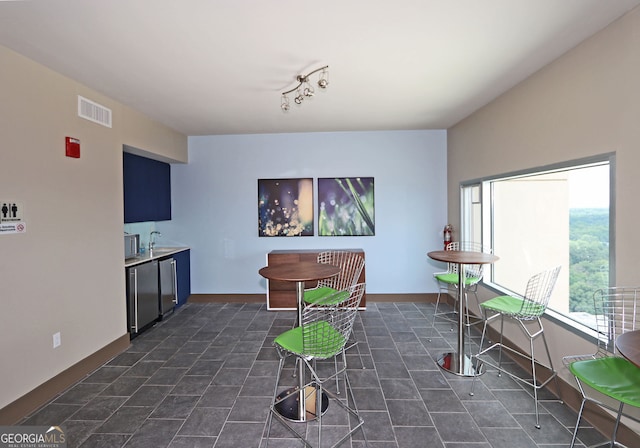 4561 Olde Perimeter Way Unit 608, Dunwoody, GA 30346 - dining room with baseboards