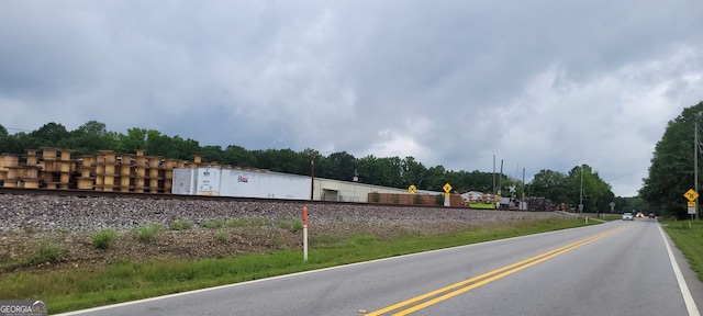 119 E Johnson St, Temple, GA 30179 - view of asphalt street featuring traffic signs