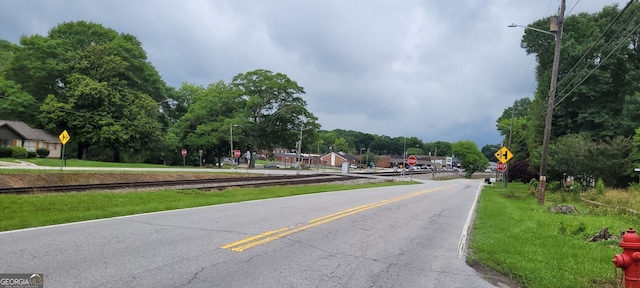 119 E Johnson St, Temple, GA 30179 - view of asphalt street with traffic signs