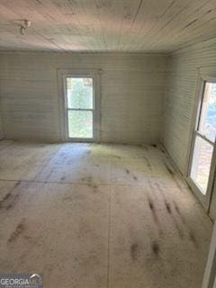 119 E Johnson St, Temple, GA 30179 - spare room with plenty of natural light and wooden ceiling