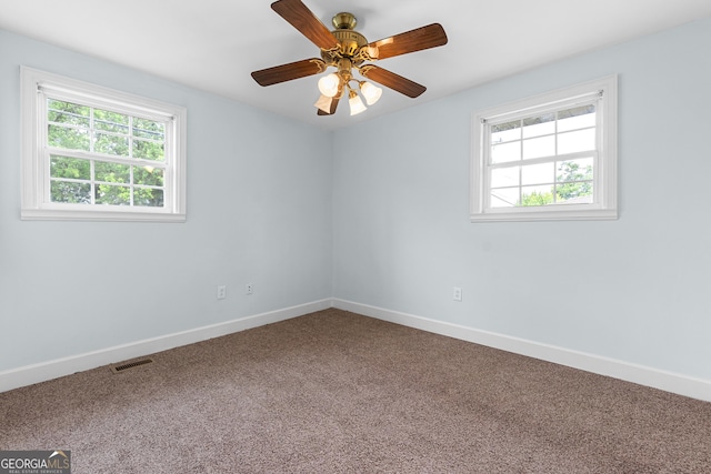 202 Kimberly Rd, Warner Robins, GA 31088 - spare room with carpet, baseboards, and a ceiling fan