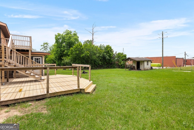 202 Kimberly Rd, Warner Robins, GA 31088 - view of grassy yard featuring a wooden deck and stairway