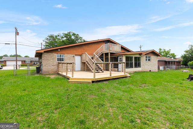202 Kimberly Rd, Warner Robins, GA 31088 - rear view of house with a deck, brick siding, a gate, and stairs