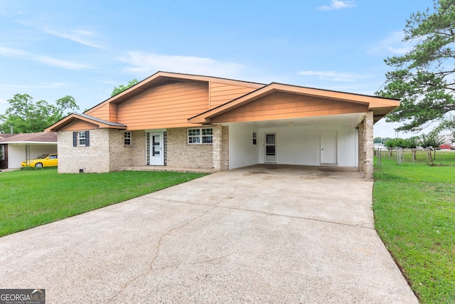 202 Kimberly Rd, Warner Robins, GA 31088 - view of front of property featuring concrete driveway, an attached carport, and brick siding