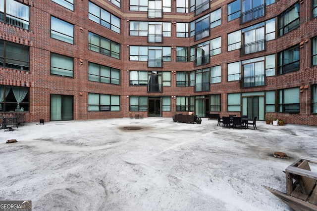 115 W Peachtree Pl NW Unit 301, Atlanta, GA 30313 - snow covered property with a view of apartment building / complex