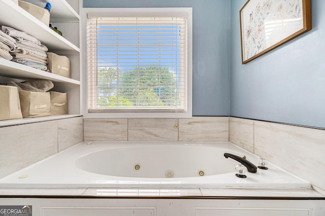 1112 Sutton Dr, Mcdonough, GA 30252 - bathroom featuring a tub with jets