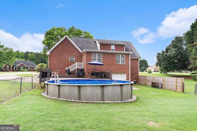 1112 Sutton Dr, Mcdonough, GA 30252 - rear view of property with brick siding and a fenced backyard