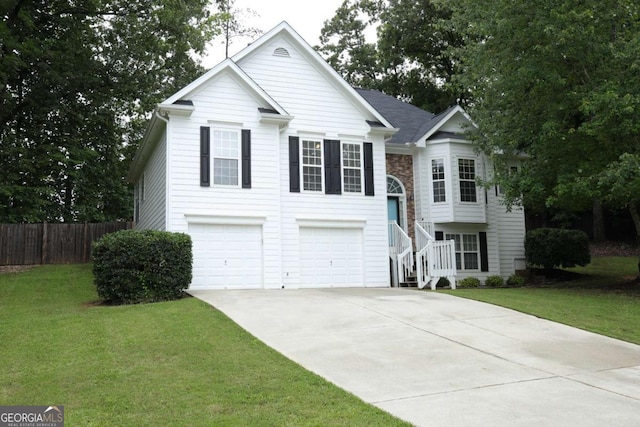 262 Devynwood Ln, Dallas, GA 30157 - raised ranch featuring concrete driveway and an attached garage