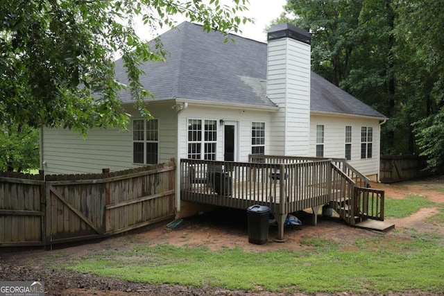 262 Devynwood Ln, Dallas, GA 30157 - back of property featuring a wooden deck, roof with shingles, and a chimney
