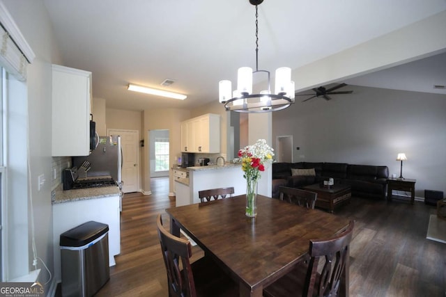 262 Devynwood Ln, Dallas, GA 30157 - dining room featuring a chandelier, dark wood finished floors, and a ceiling fan