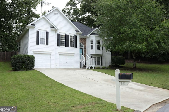 262 Devynwood Ln, Dallas, GA 30157 - bi-level home featuring driveway, an attached garage, and stairway