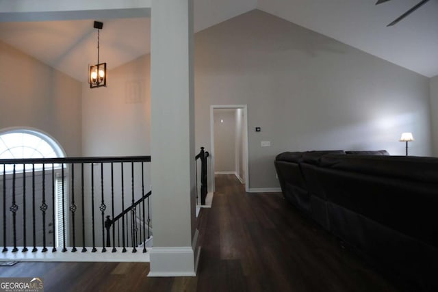 262 Devynwood Ln, Dallas, GA 30157 - corridor with an upstairs landing, wood finished floors, high vaulted ceiling, and a chandelier