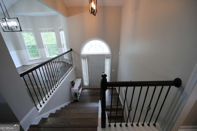 262 Devynwood Ln, Dallas, GA 30157 - stairs with a chandelier and wood finished floors