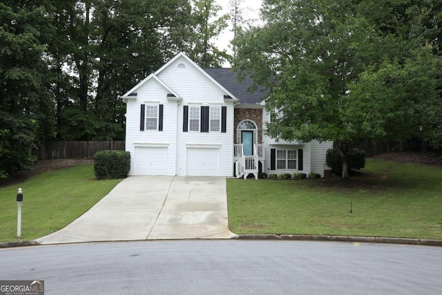 262 Devynwood Ln, Dallas, GA 30157 - bi-level home featuring an attached garage and concrete driveway