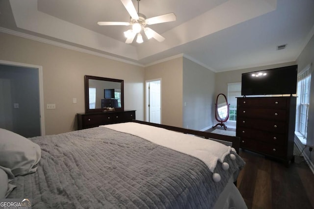 262 Devynwood Ln, Dallas, GA 30157 - bedroom with a raised ceiling, dark wood-type flooring, a ceiling fan, and ornamental molding