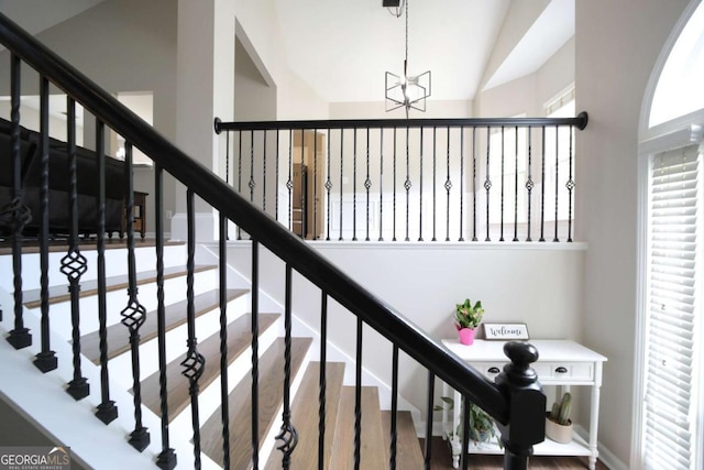 262 Devynwood Ln, Dallas, GA 30157 - stairs with a chandelier and high vaulted ceiling
