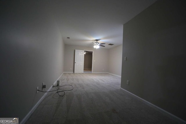 262 Devynwood Ln, Dallas, GA 30157 - spare room featuring ceiling fan and light carpet